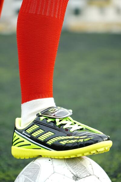 کفش فوتبال مردانه مدل آستروتورف براق زرد برند PROTOPTAN